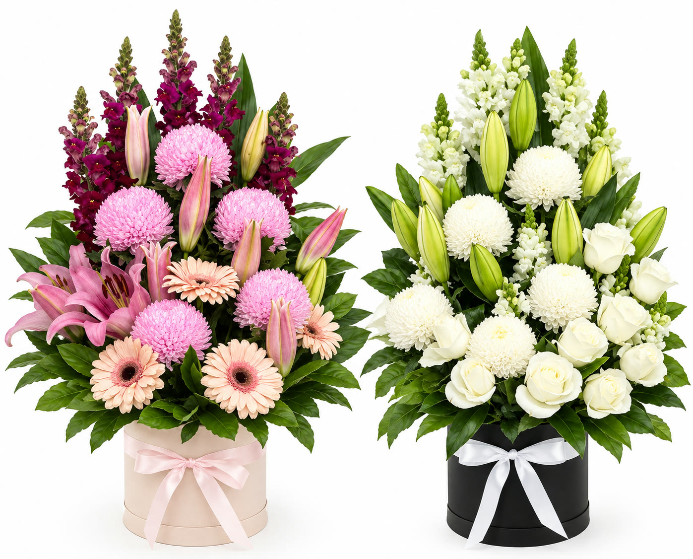 Two box arrangements — pink florals in a pink box and white florals in a black box