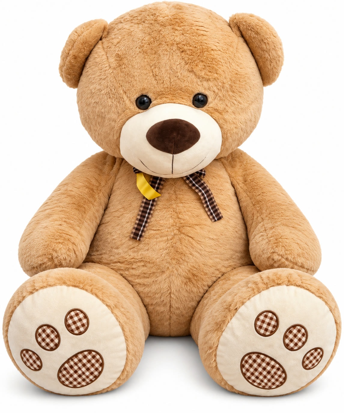 Large tan teddy bear with a checked ribbon bow